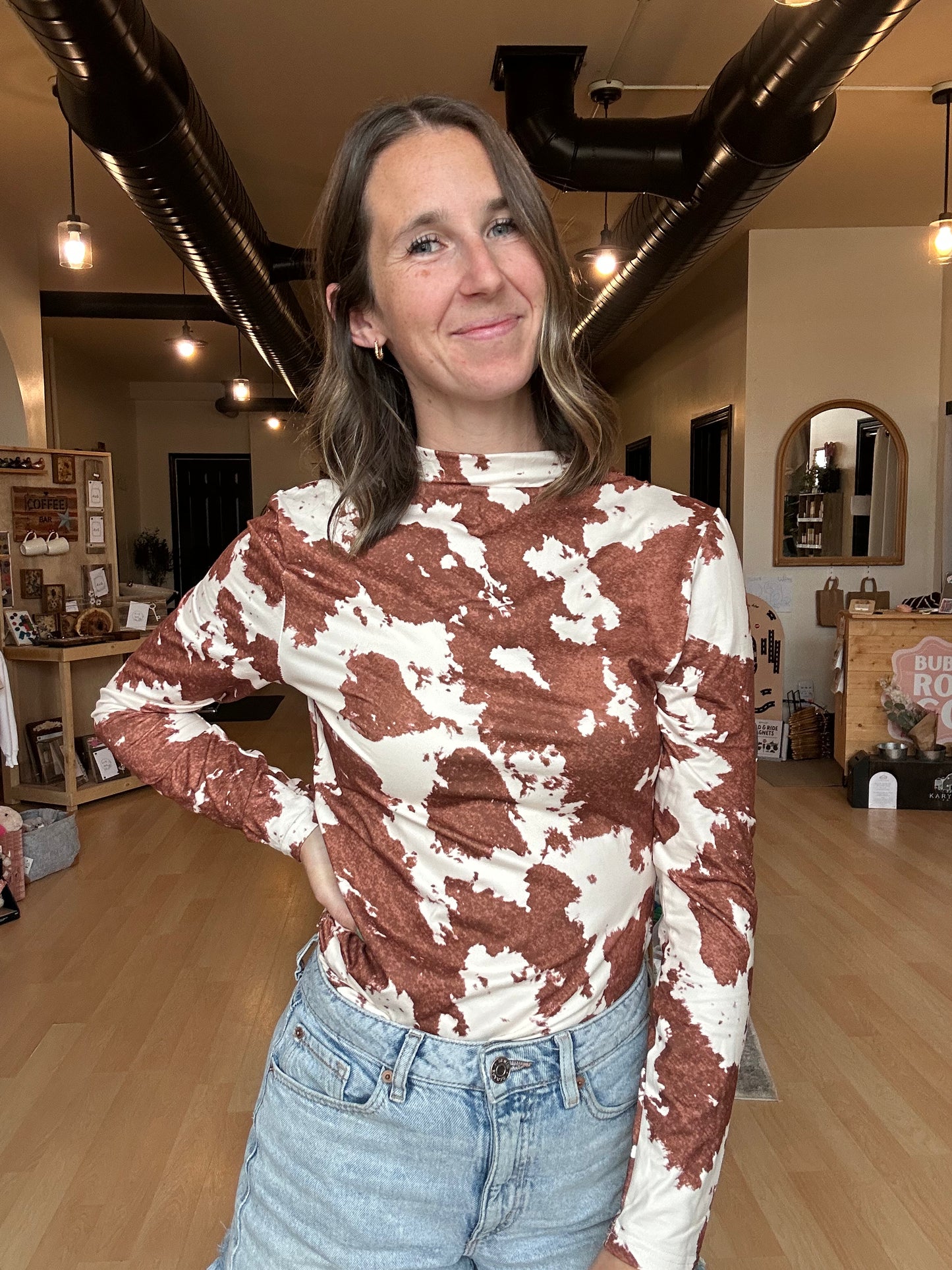 Cow Print Mock Neck Top